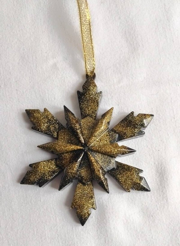 Suspension de Noël étoile 3D noir pailleté or