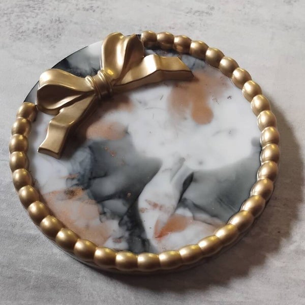 Vide poche rond nœud or