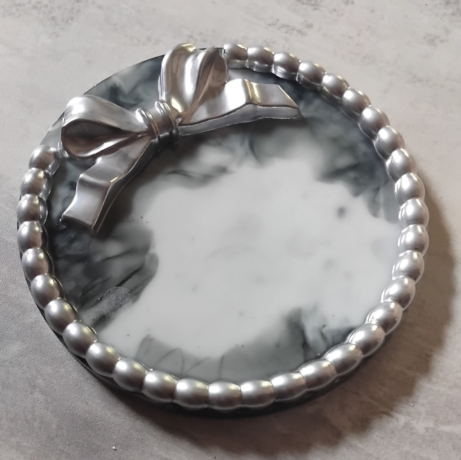 Vide poche rond nœud argent