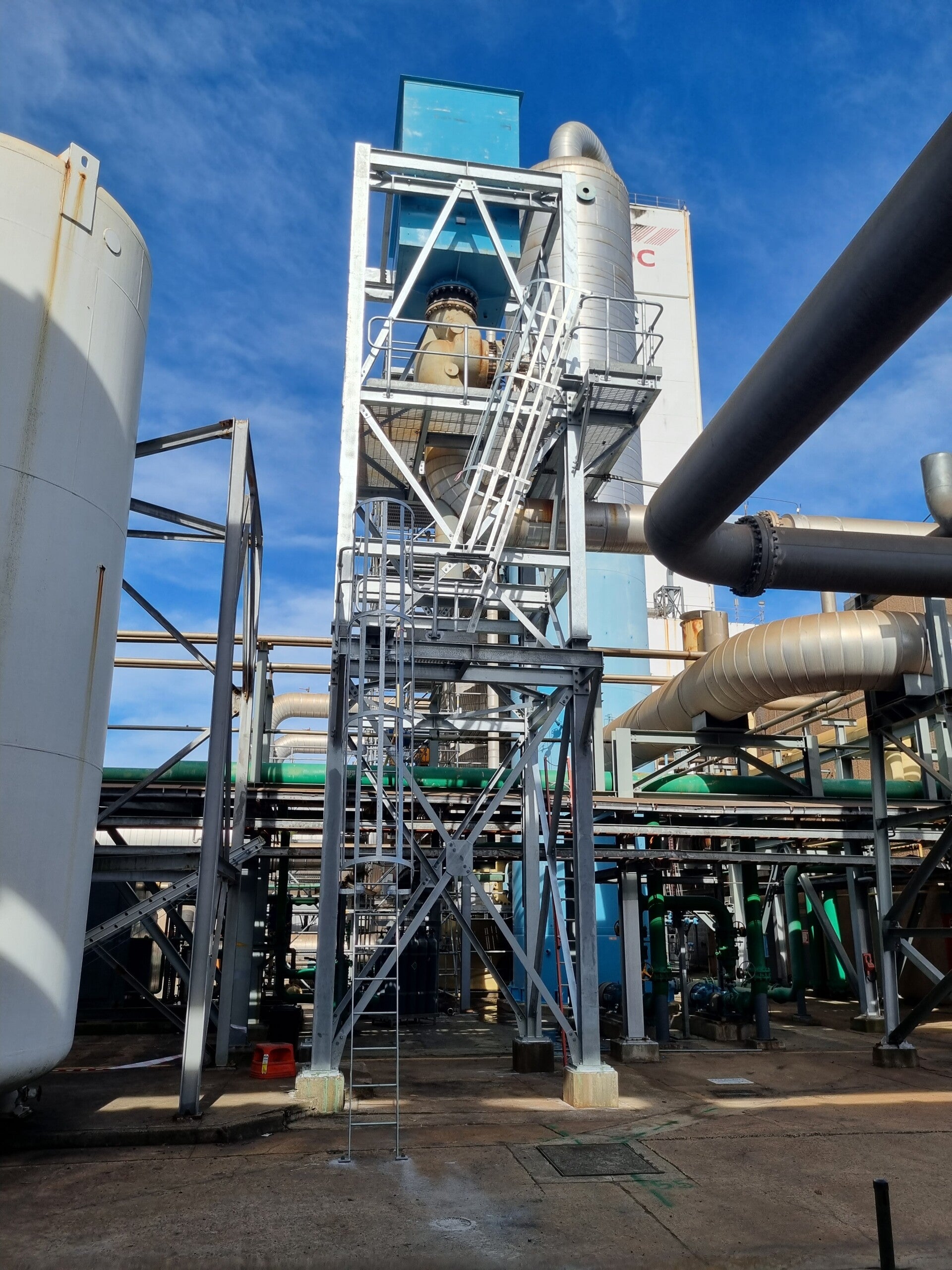 3D model of a tall structural steel structure showing detailed steelwork, connections, and coordinated fabrication information.