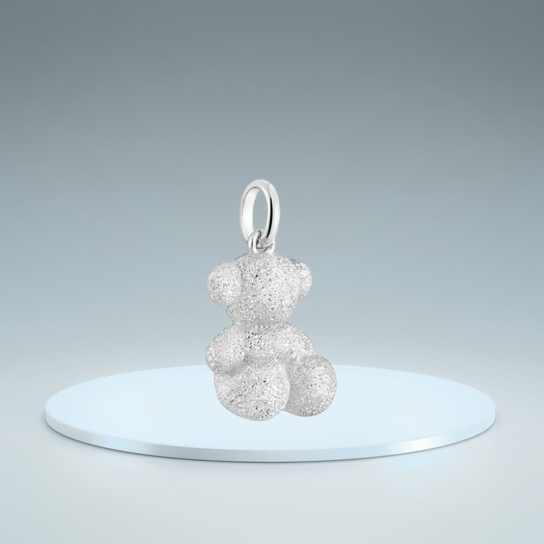 Dije  oso plateado granate 1.6 cm