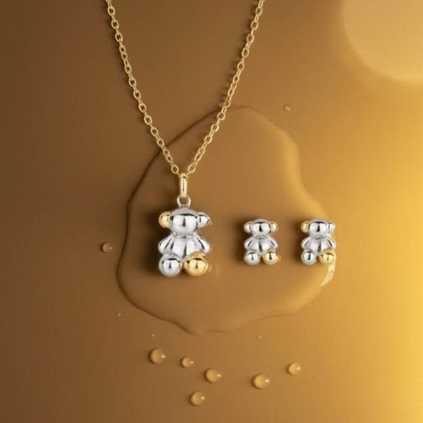 Conjunto oso dorado y plata