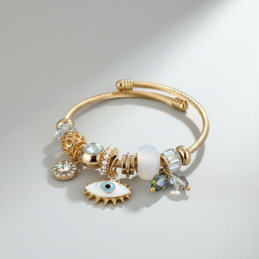 Brazalete charms ojo blanco