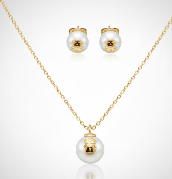 Conjunto oso con perlas dorado