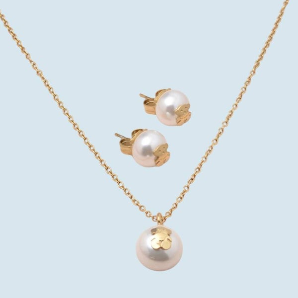 Conjunto oso y perla dorado