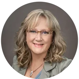 Photo of Eva Kuenzig director.