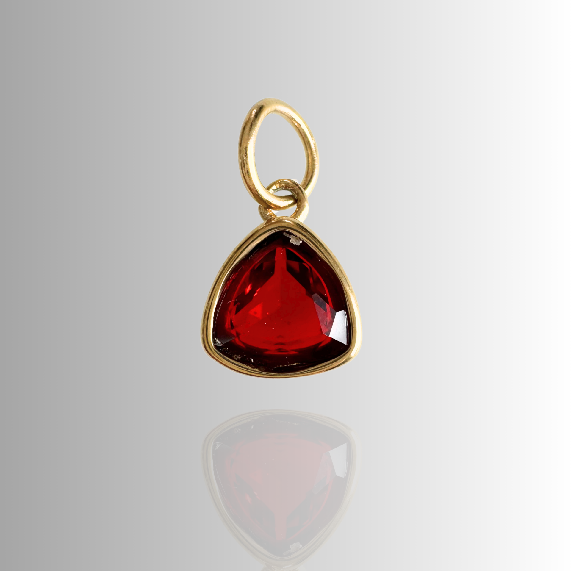 Red triangle charms