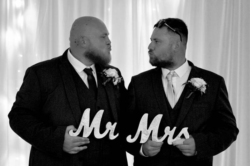 groom and best man being silly 