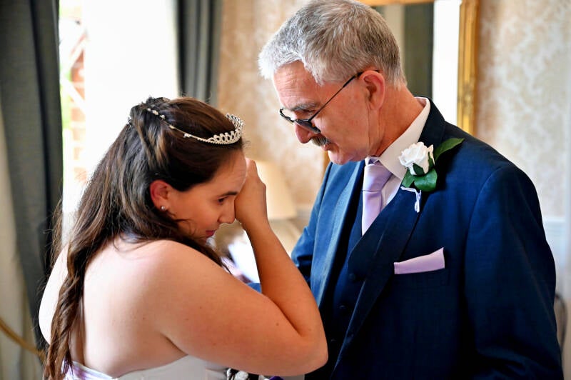 dad and daughter moment pre wedding 