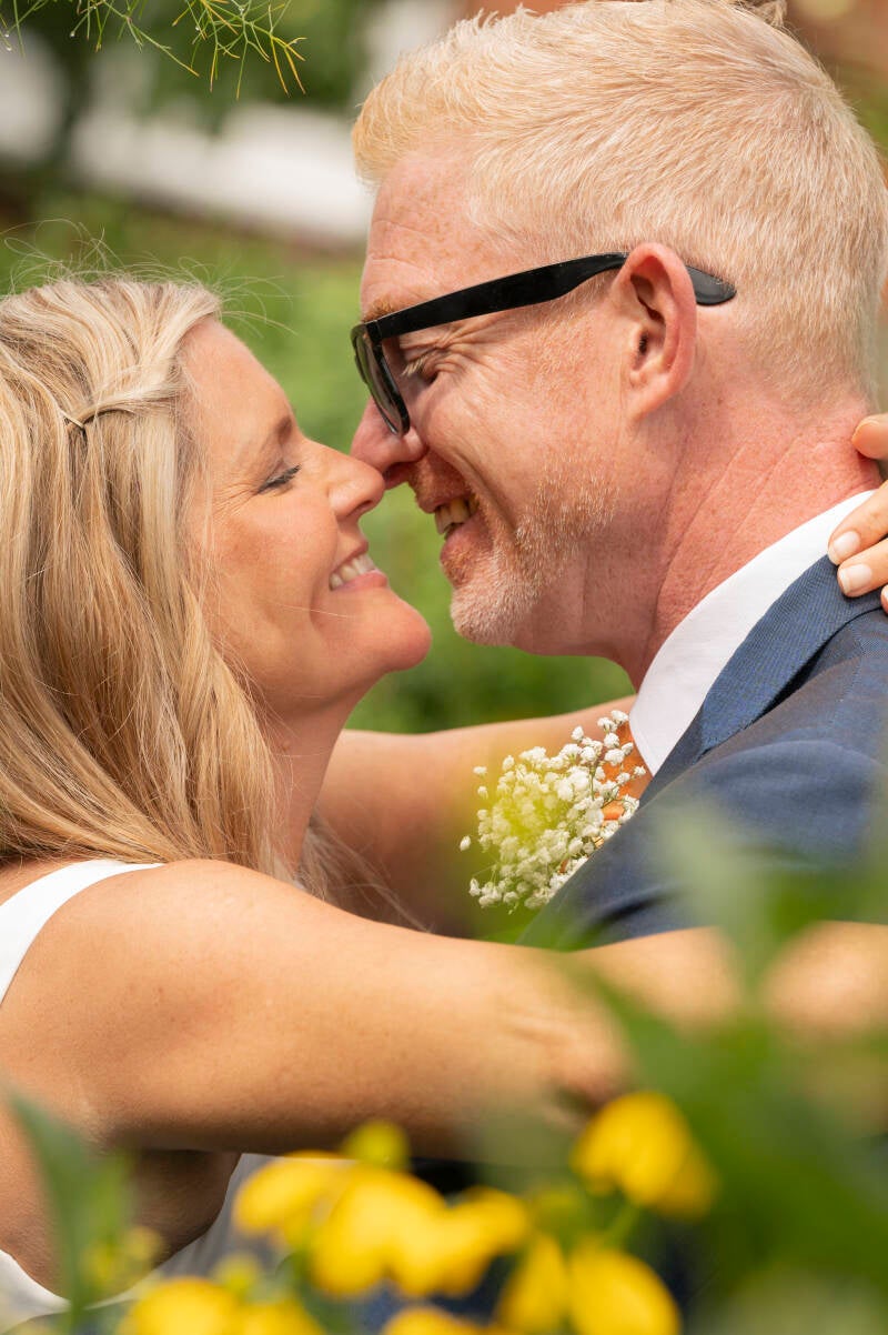 framed by flowers intimate moment