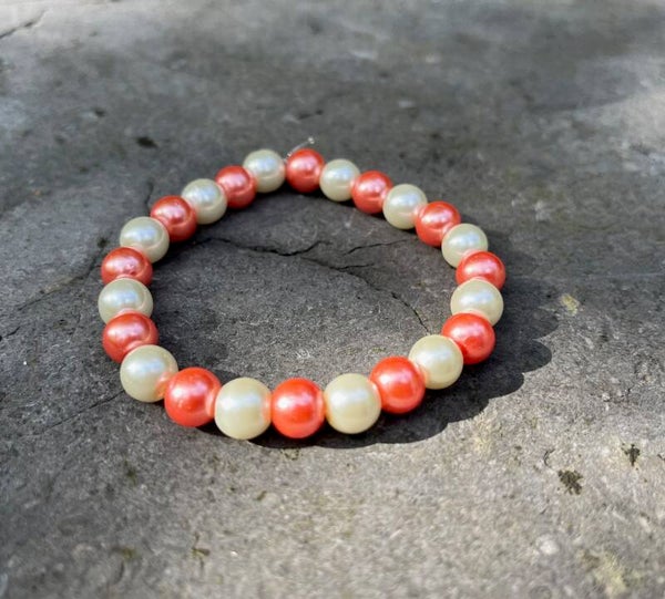 Armband parels magenta/creme