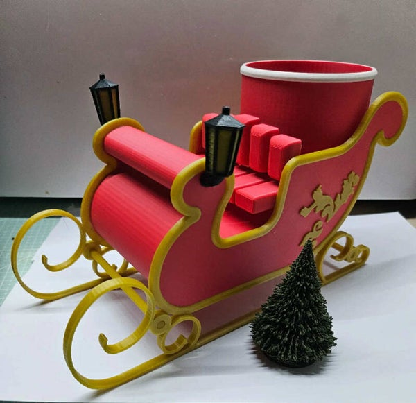 Jultomtens släde - godishållare