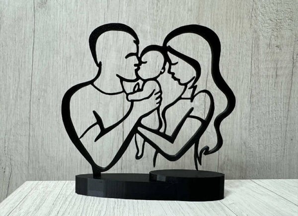 Statyett - Familj med bebis