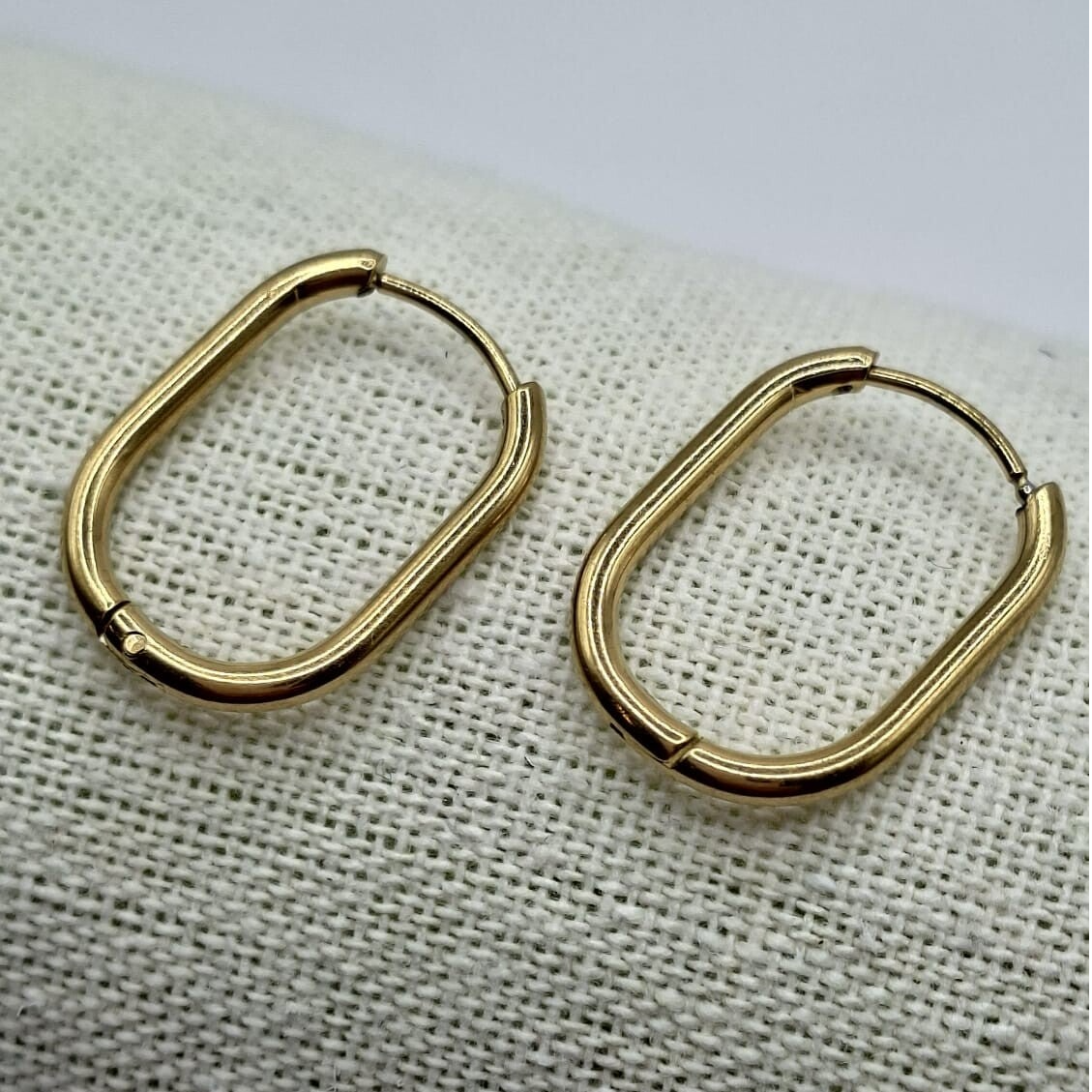 Ring oorbellen met bedel hartjes gold look