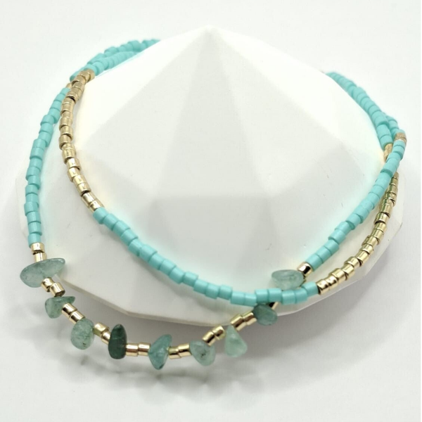 Kralenarmband, zilveren en blauwe kraaltjes met steentjes