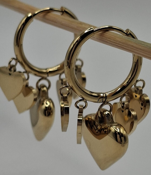 Ring oorbellen met bedel hartjes gold look