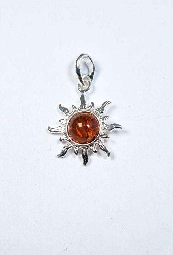 Pendentif AMBRE forme soleil 2cm