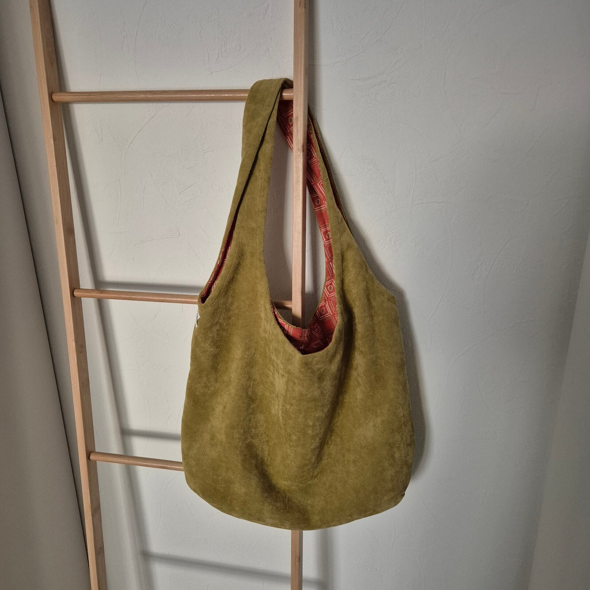 Schoudertas mosgroen met retro voering