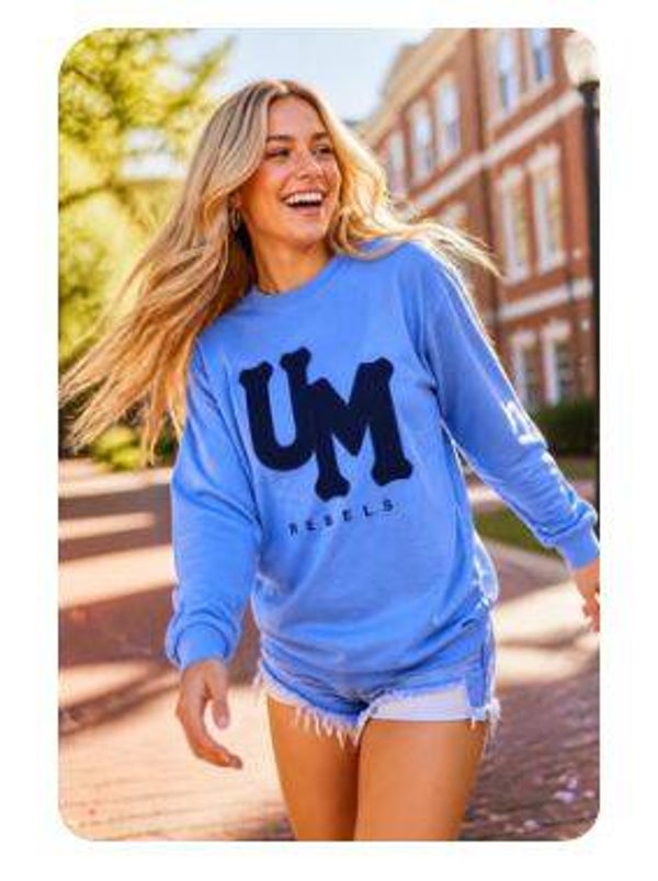 Powder Blue Unisex Tee-Shirt with navy UM Rebel lettering