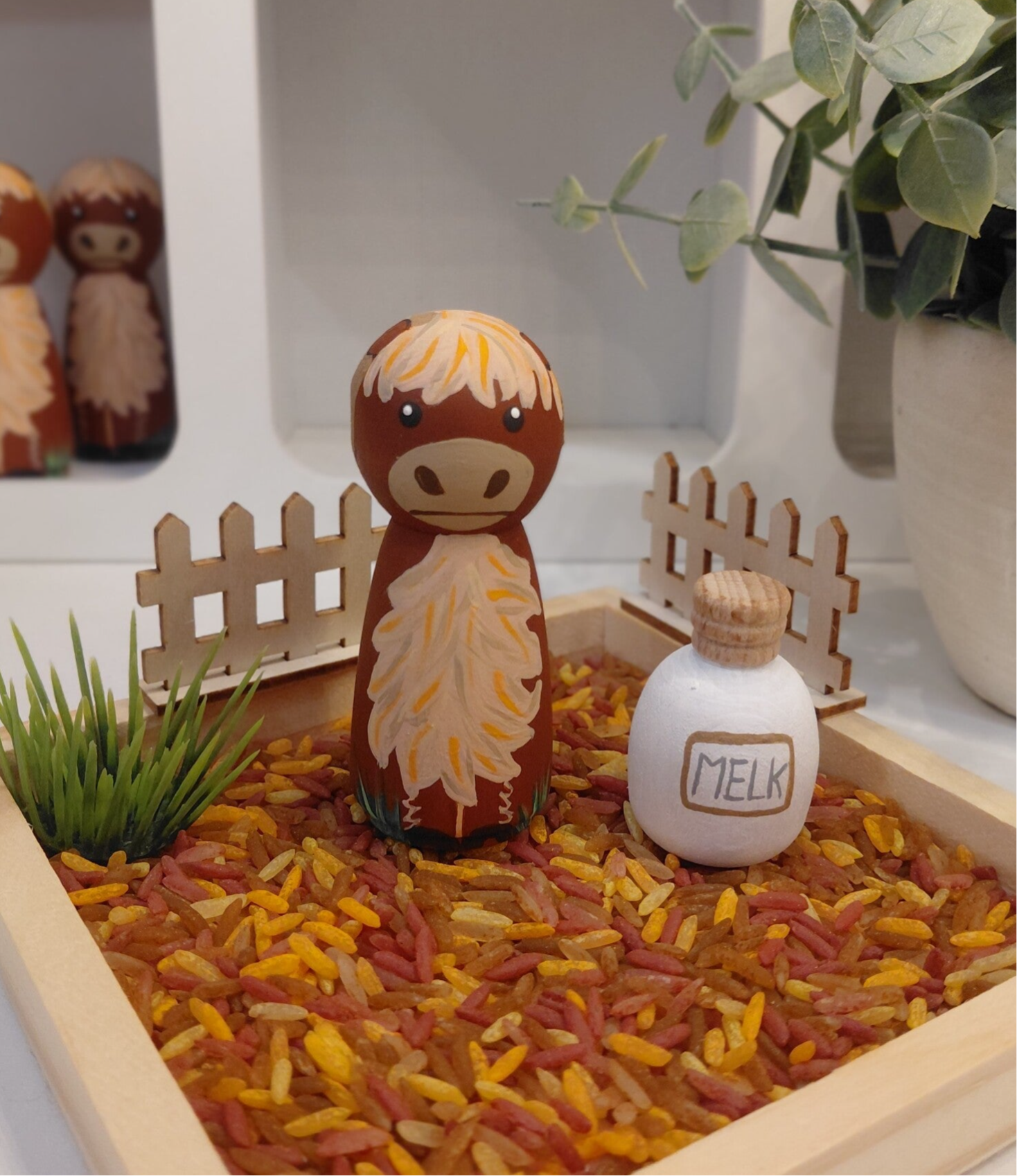 Pegdoll Schotse hooglander met melkfles