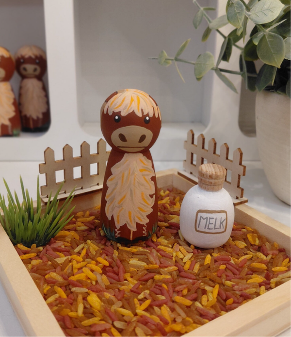 Pegdoll Schotse hooglander met melkfles
