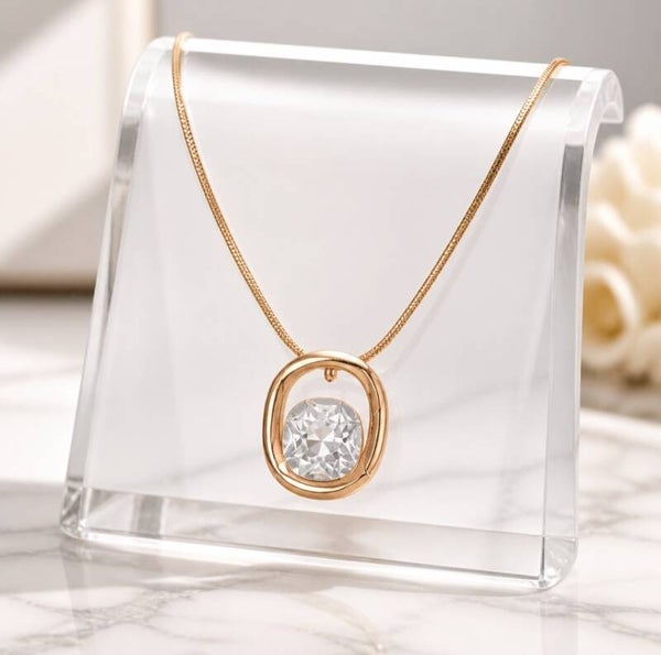 Collar Colgante Ovalado con Cristal Flotante en Acero Quirúrgico y Oro 18k