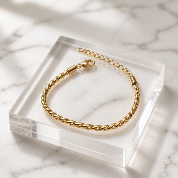 Pulsera Trenzada Twist Glow - acero oro 18klt