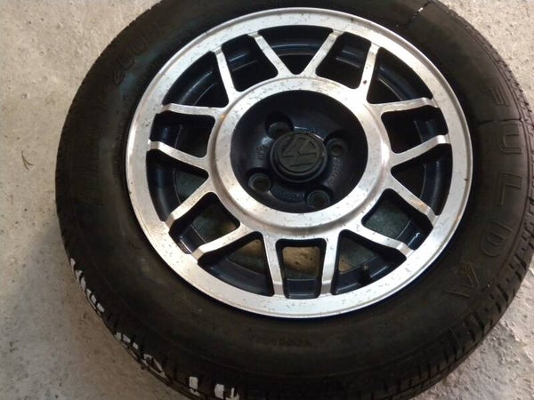1x VW Golf II GTi+Cabrio 14" LM velg nieuw, met band
