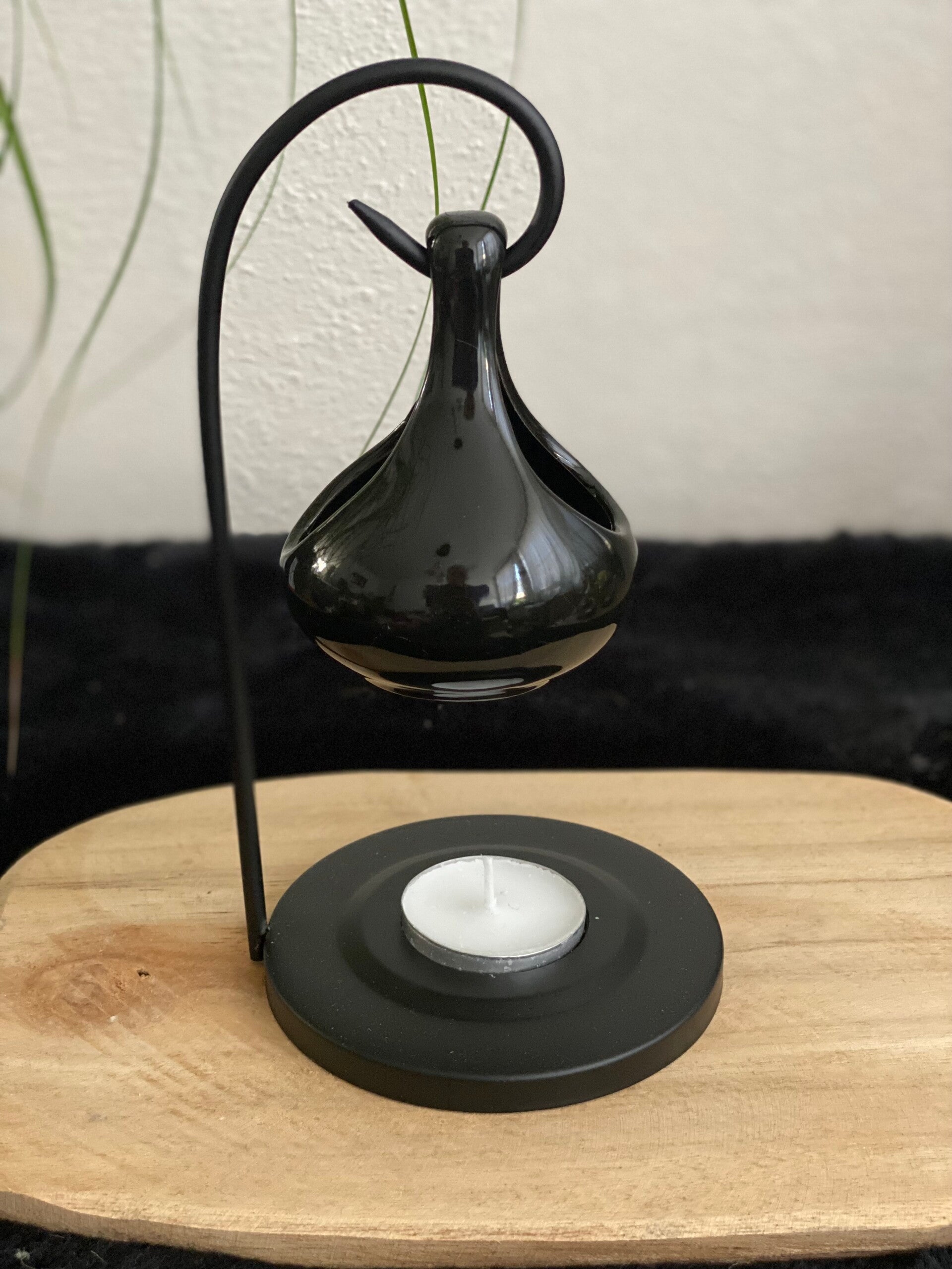 Wax-, oliebrander druppel zwart