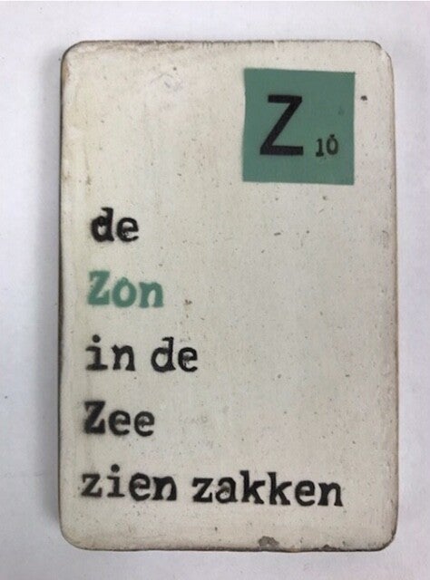 De Zon in de zee zien zakken - scrabble magneet