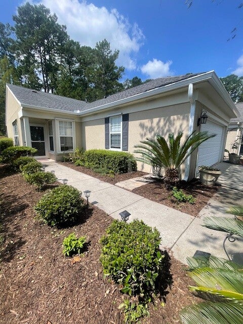 6 inch seamless white gutters with 3x4 downspouts along 