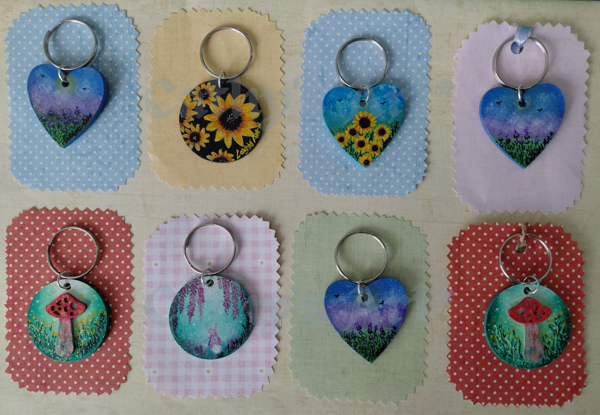 A collection of keyrings featuring original artwork by Cathy's Art*