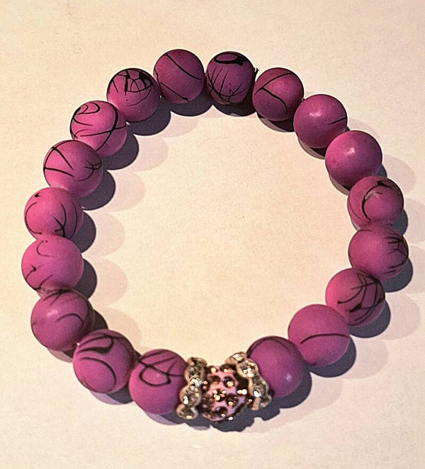 Bracelet Shamballa 1 boule parme + 18 perles mauves
