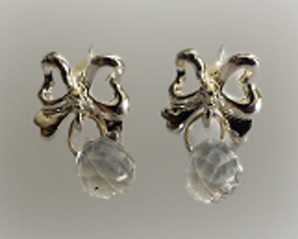 Boucles d'oreilles nœud argenté fantaisie