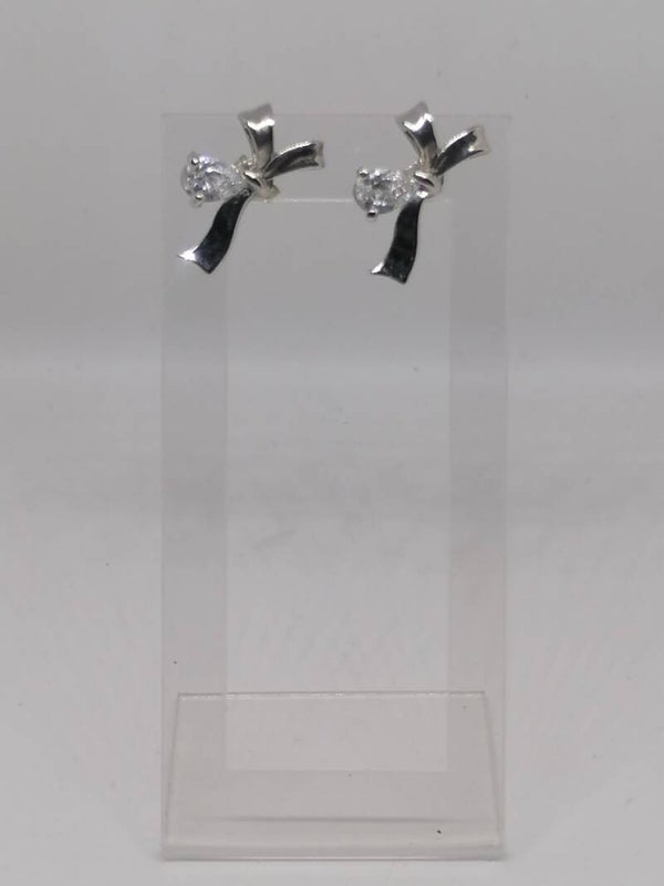 Boucles d'oreilles forme nœud argenté avec strass fantaisie