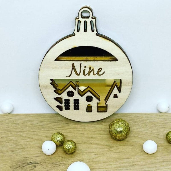 Kerstbal in hout en acrylaat