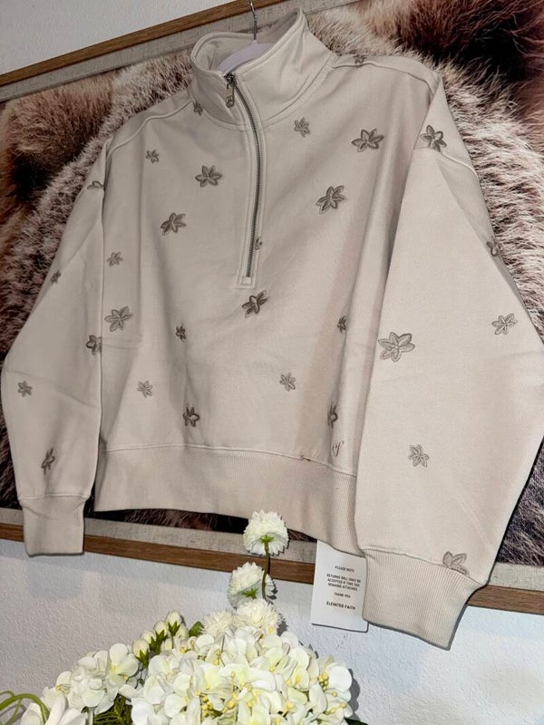 Floral embroidered half zip