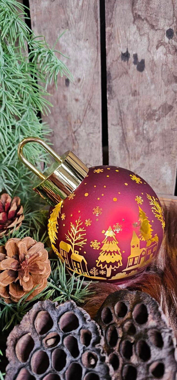 Roterende rode kerstbal met verlichting