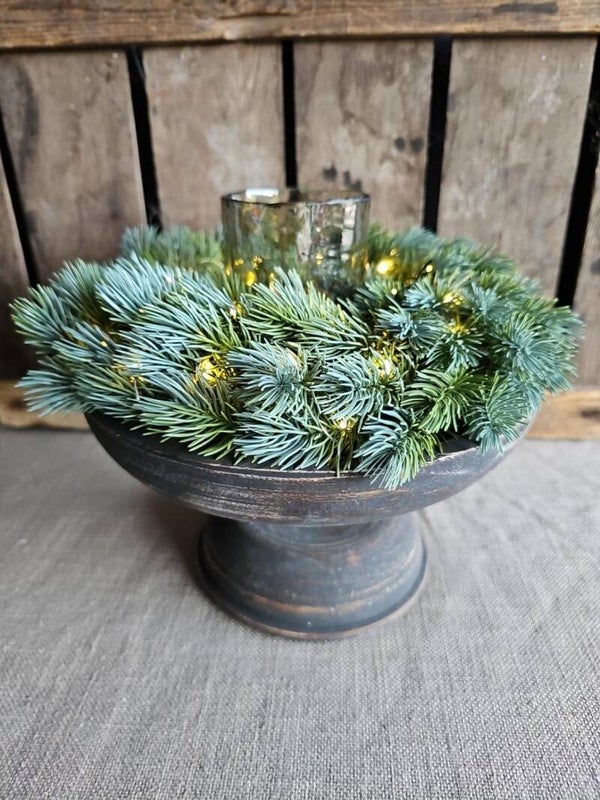 Kerststuk op schaal met verlichting