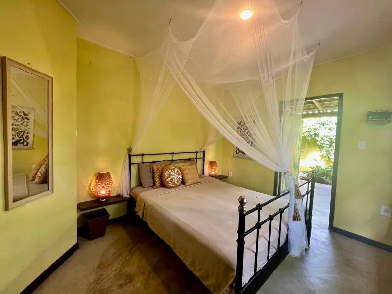 De Octopus Tropical Oasis Eco retreat Curaçao slaapkamer appartement  troupiaal