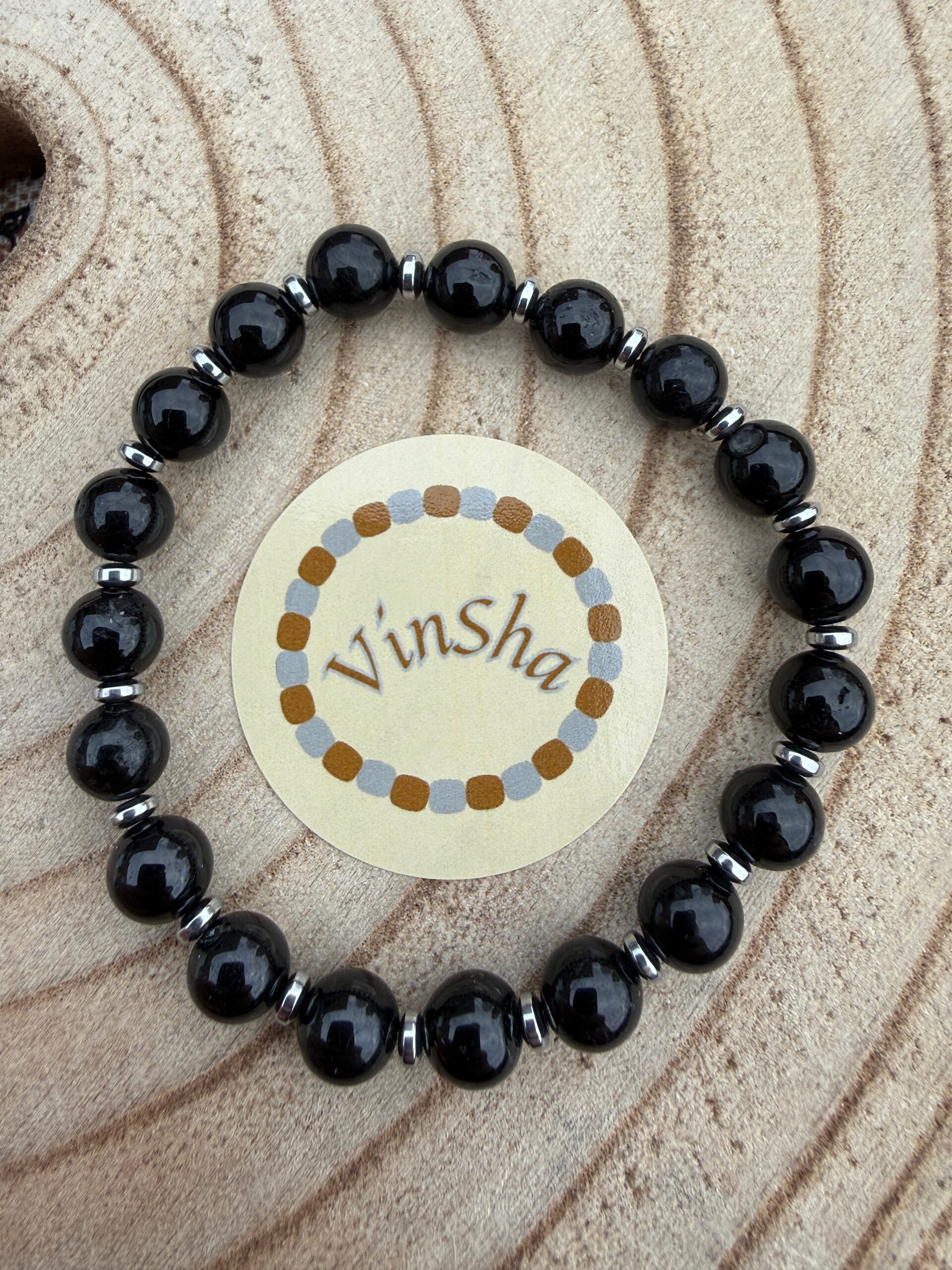 Zwarte Onyx met zilveren tussenstukjes