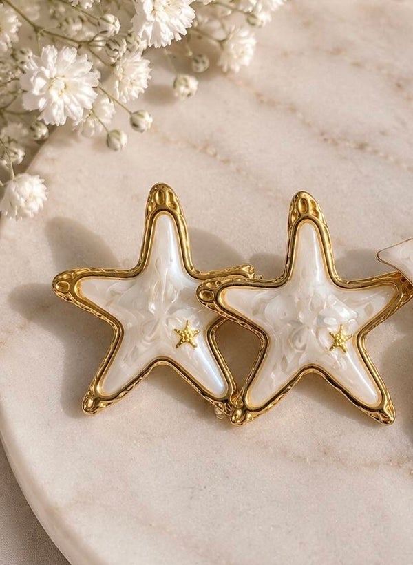 Boucles d'oreilles étoile blanche