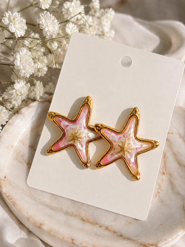 Boucles d'oreilles étoile rose poudré