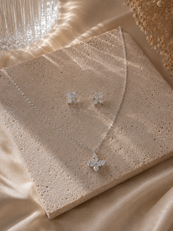 Parure argentée en papillon