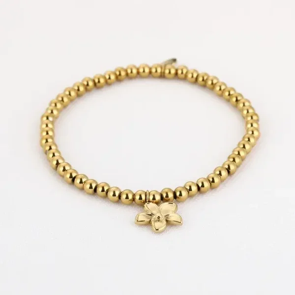 Bolletjes Armbandje met Bloembedeltje