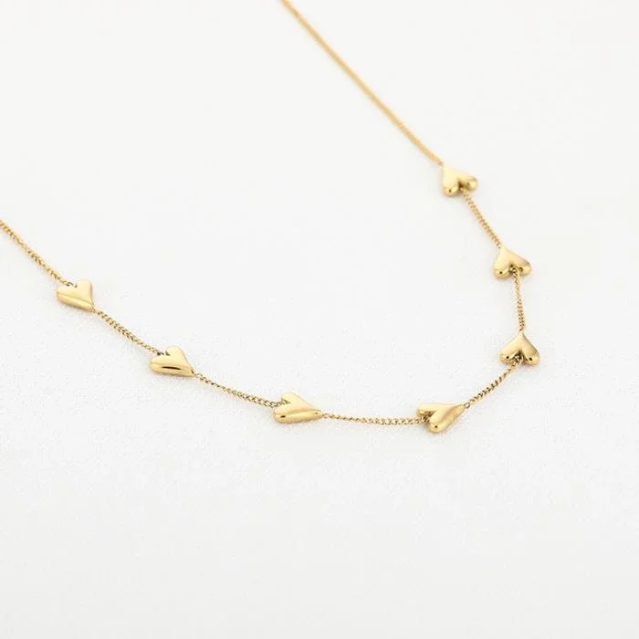 Ketting tiny hearts goud