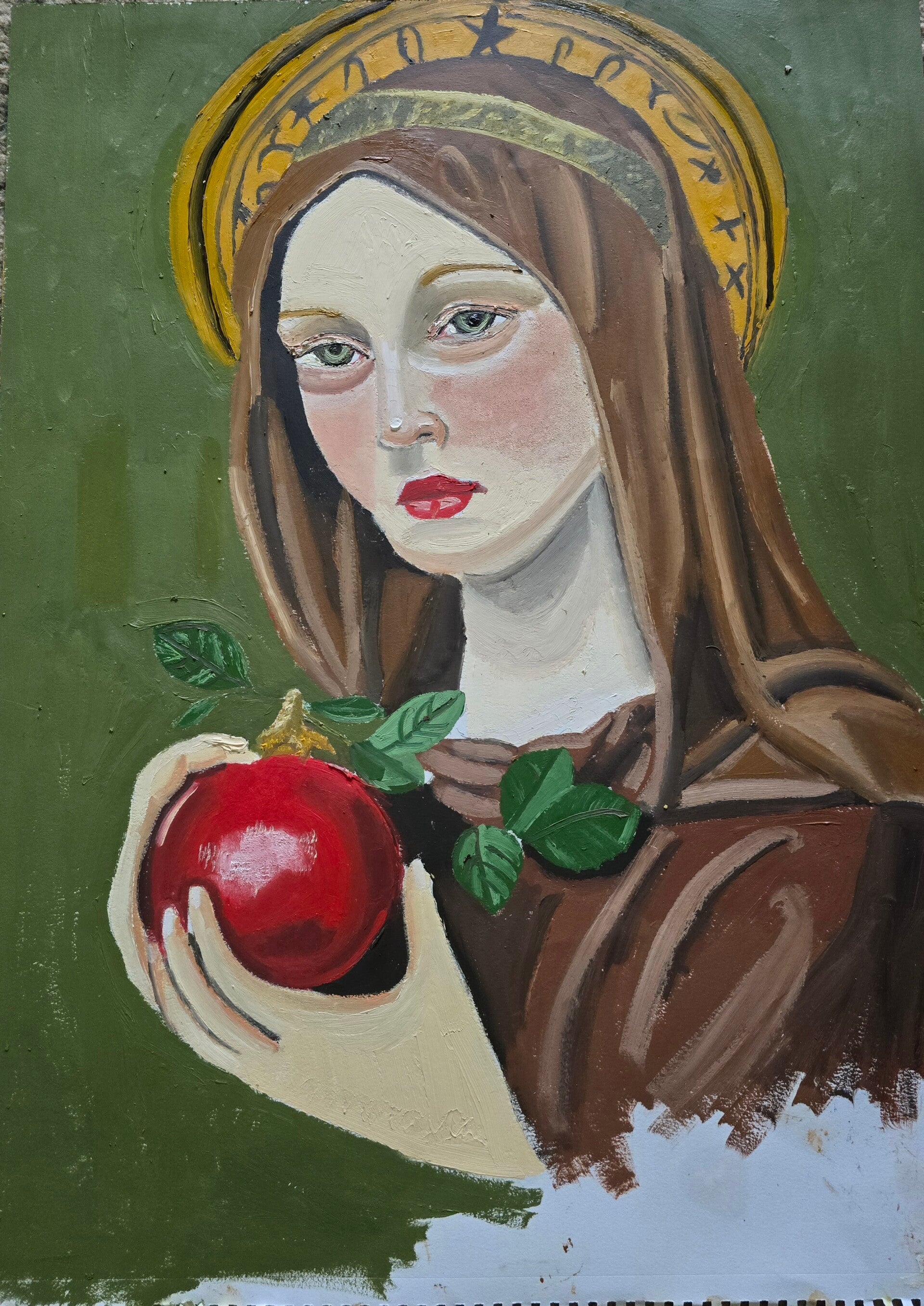 Saint holding apple