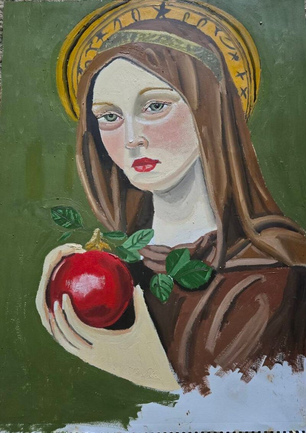 Saint holding apple