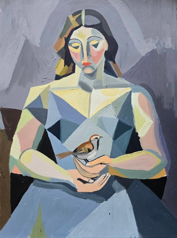 woman holding a wren