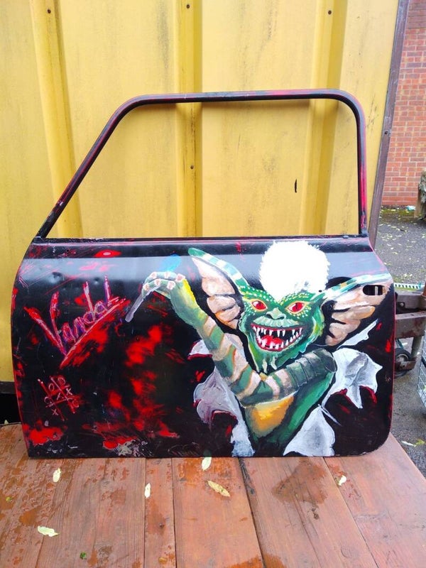 Gremlin in an old car door